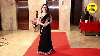 Tammu b. in Black Meroon saree