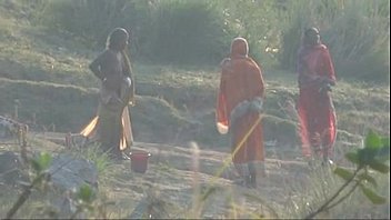 Desi granny changing after bath on river