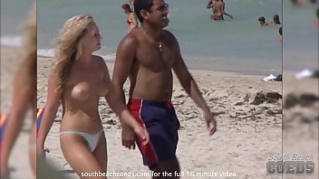 beautiful hot chicks showing skin on teh beach