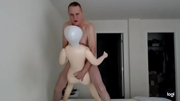 Kevin Yardley fucks blow up doll standing up and cums